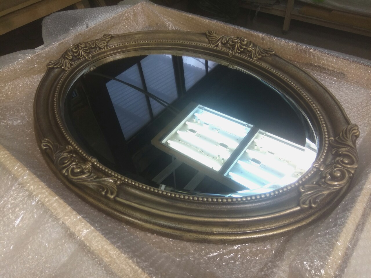 Овальное зеркало в классическом багете Пацифик бронза