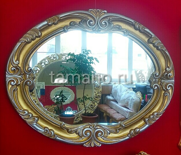 Красивое овальное зеркало в багетной раме.jpg