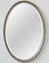 Овальное зеркало в современной раме Глобо серебро, 61см х 89см